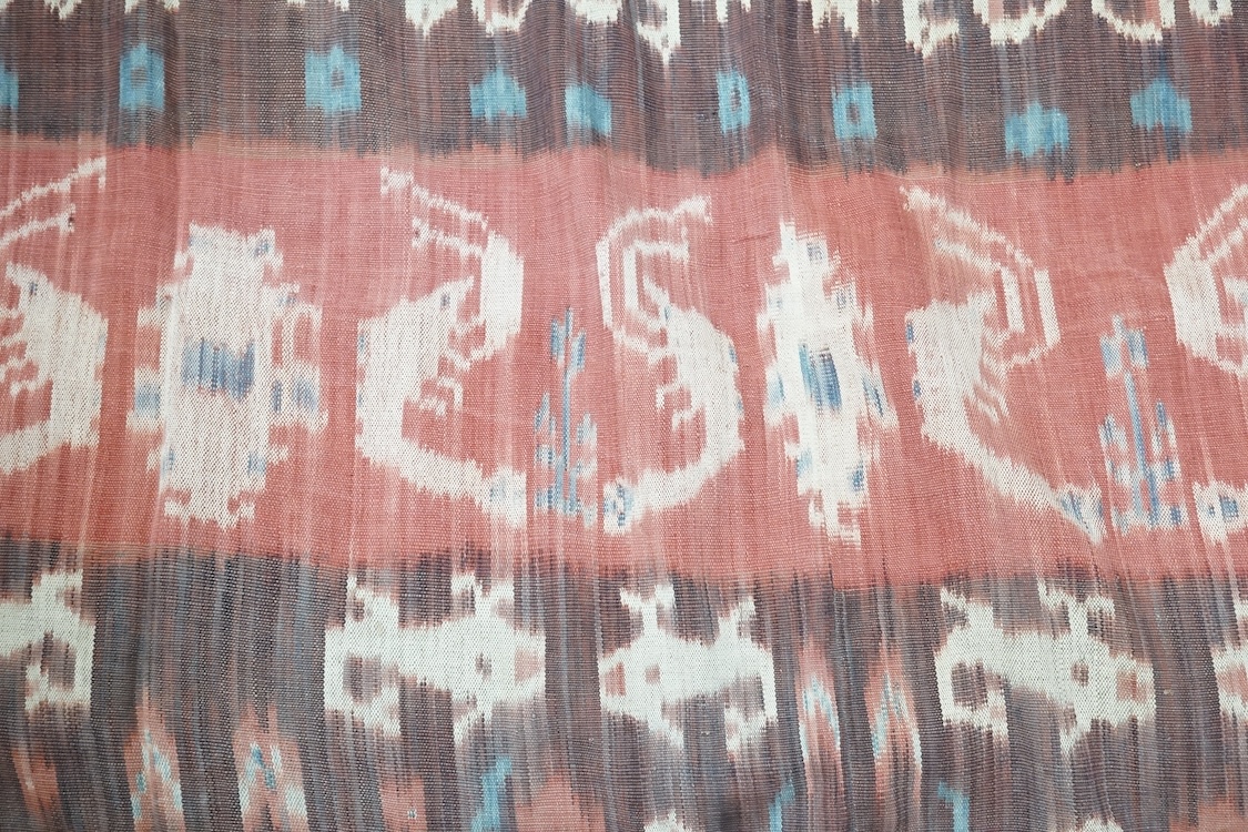 A Sumbanese shoulder cloth, an Indian chain stitch panel and a finely woven silk stole